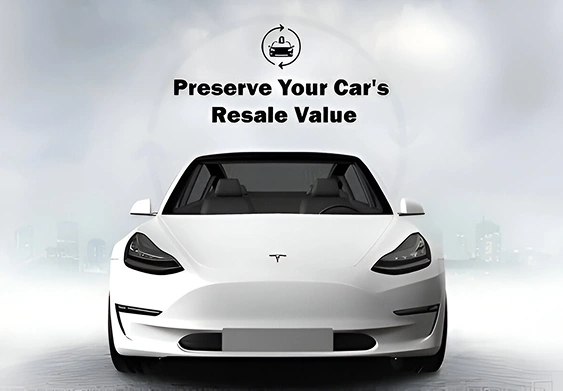 Front view of a white Tesla Model 3 with a clean, sleek appearance, accompanied by the text “Preserve Your Car’s Resale Value” above the vehicle.